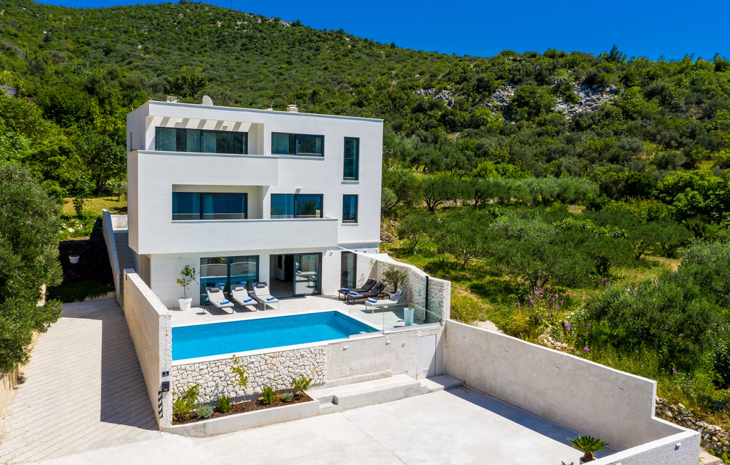 Seafront white villa with extra plot near Dubrovnik